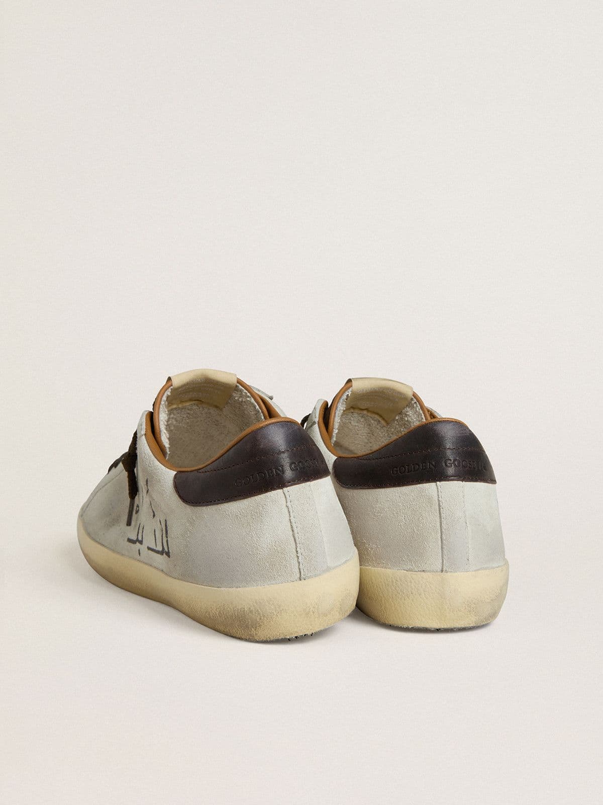 Men's Super-Star LTD in gray suede with perforated star and ebony suede tongue