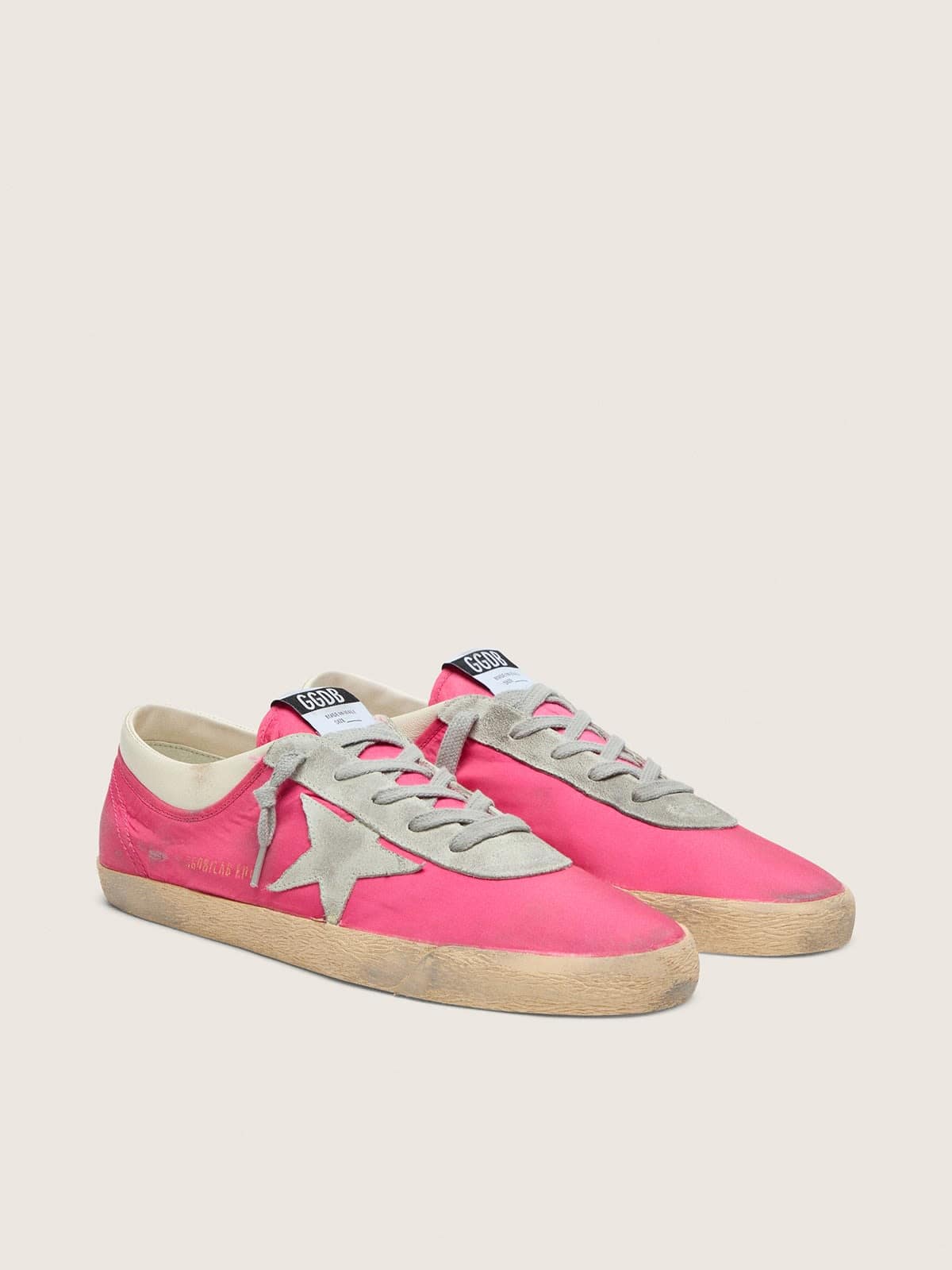 Men’s Super-Star in neon pink nylon with light gray suede star