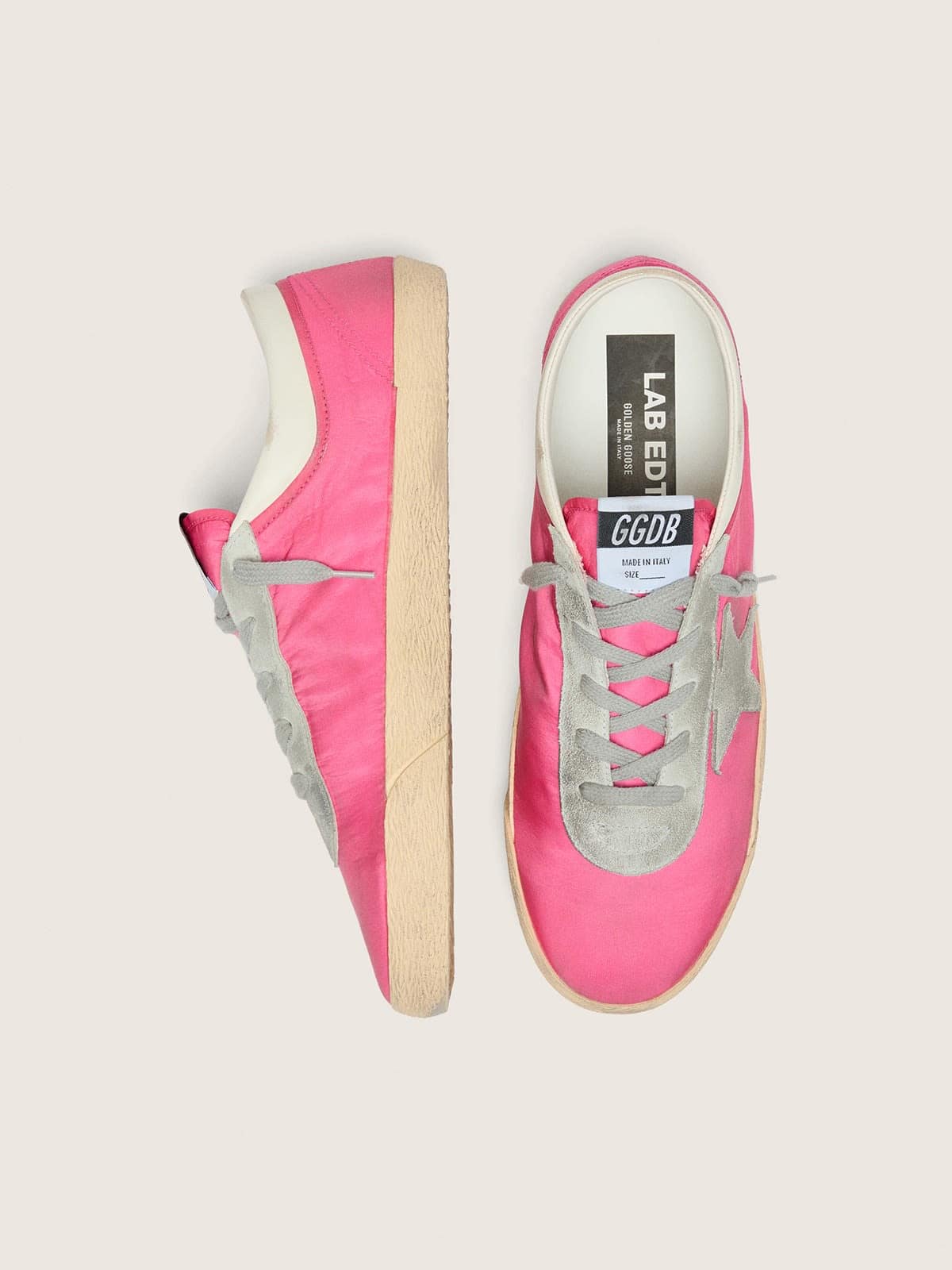 Men’s Super-Star in neon pink nylon with light gray suede star