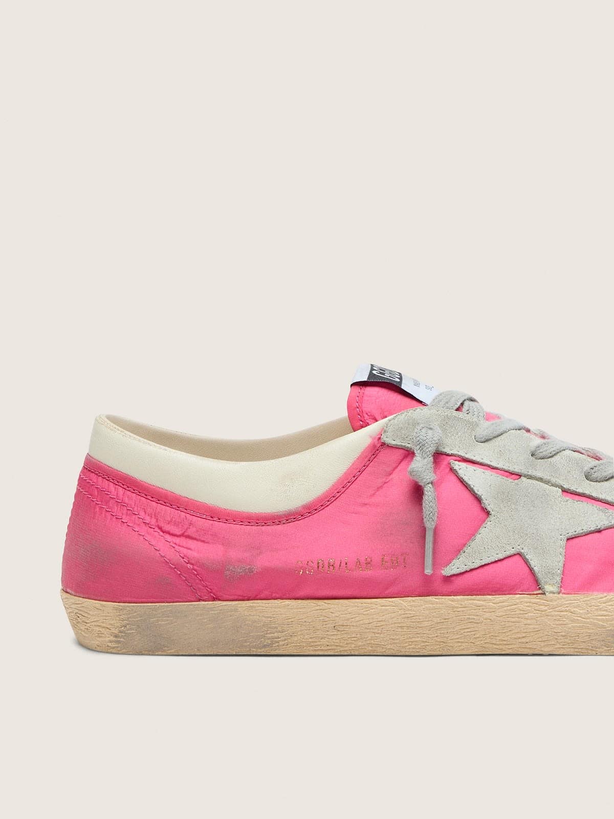 Men’s Super-Star in neon pink nylon with light gray suede star