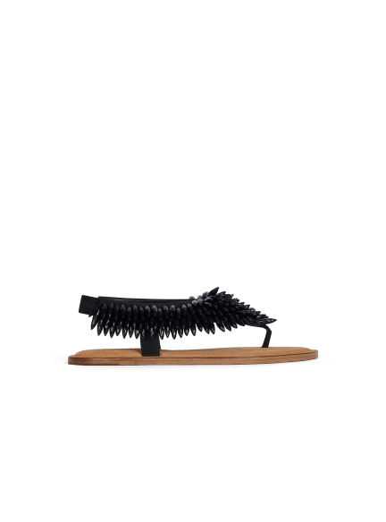 Flat sandals in suede and beads