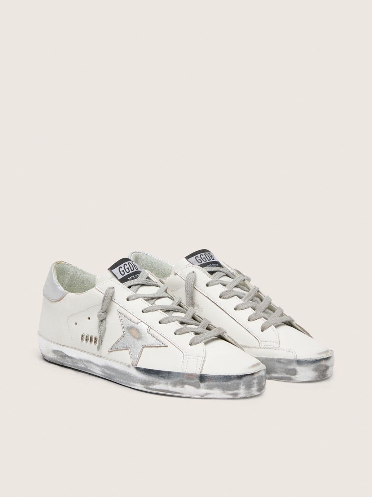 Women's Super-Star with silver sparkle foxing and metal stud lettering