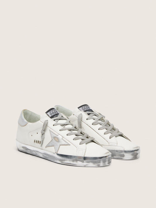Women's Super-Star with silver sparkle foxing and metal stud lettering