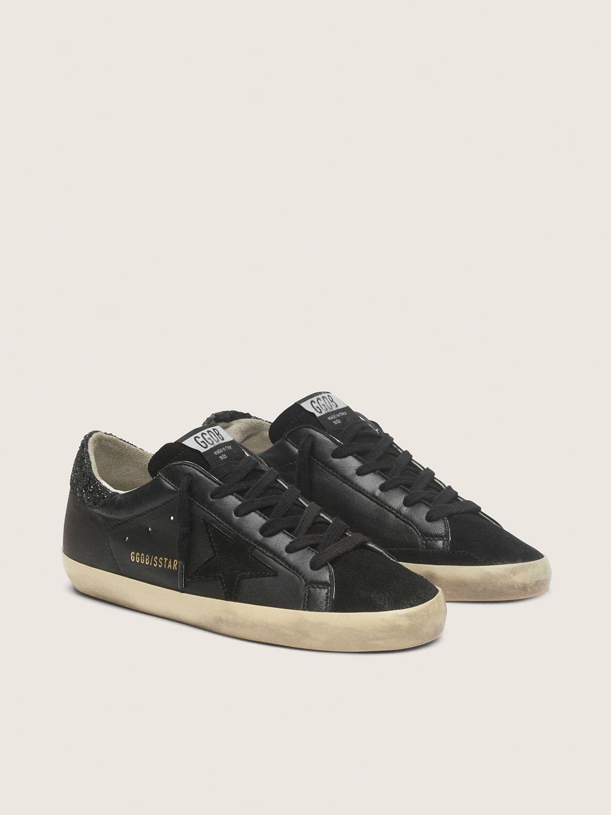 Women's Super-Star in black nappa with black star and glitter heel tab