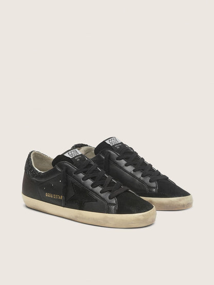 Women's Super-Star in black nappa with black star and glitter heel tab