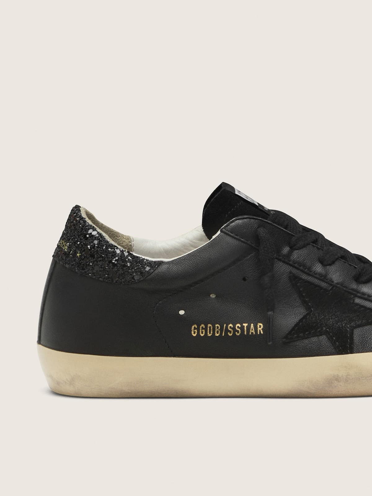 Women's Super-Star in black nappa with black star and glitter heel tab