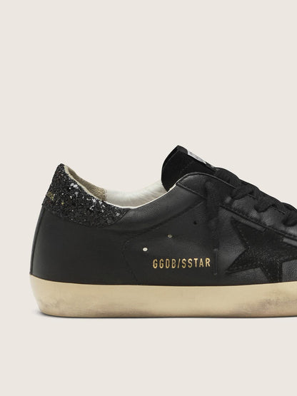 Women's Super-Star in black nappa with black star and glitter heel tab