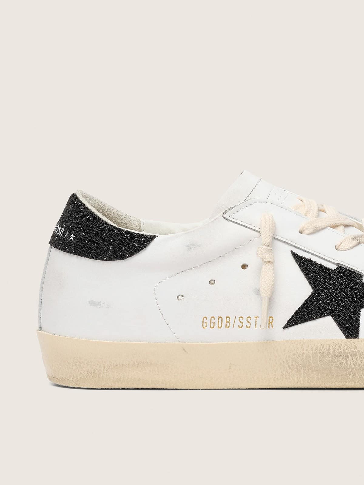 Women’s Super-Star with a black Swarovski crystal star and heel tab