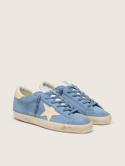 Super-Star in light blue suede with beige leather star and heel tab
