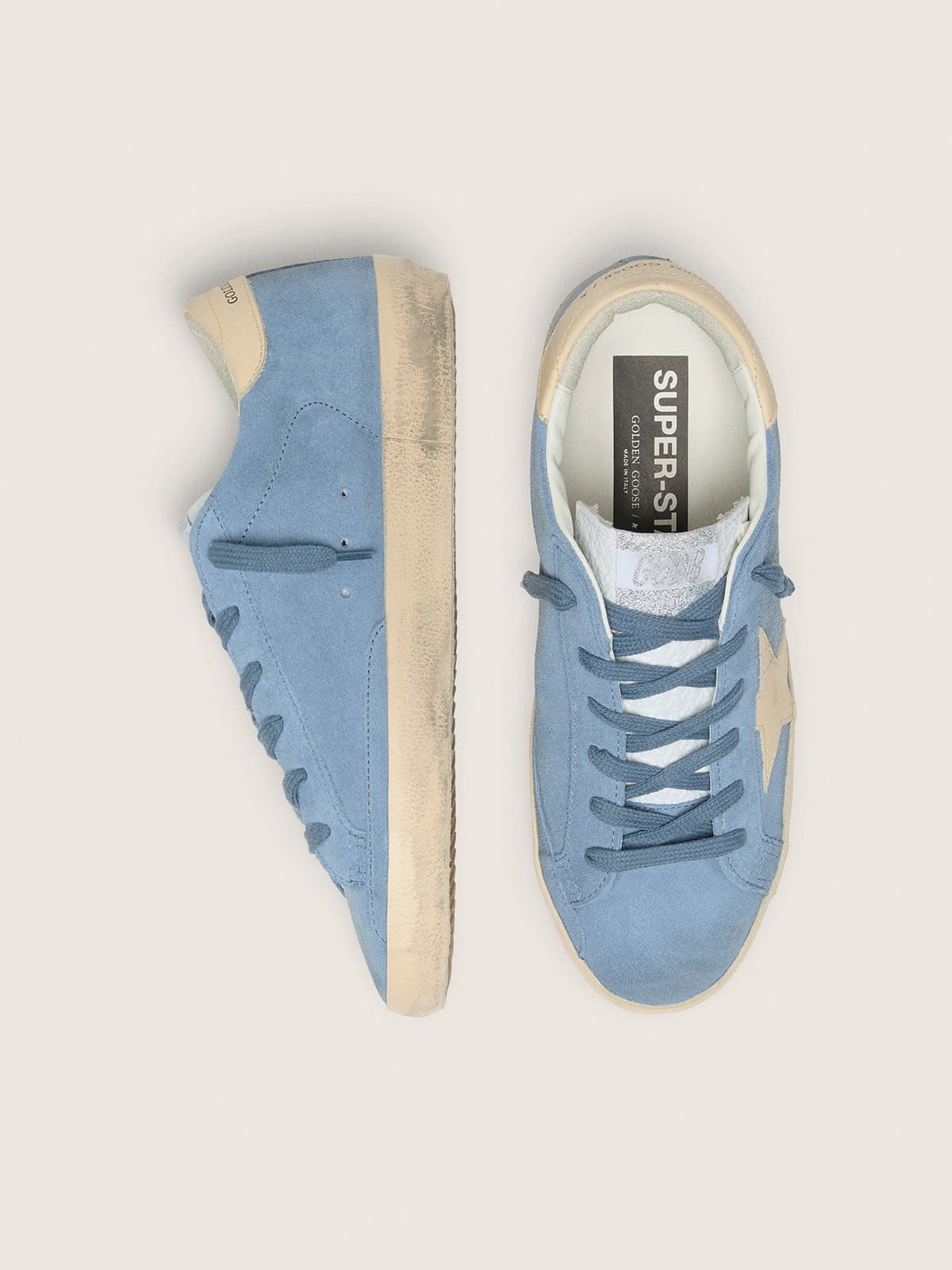 Super-Star in light blue suede with beige leather star and heel tab
