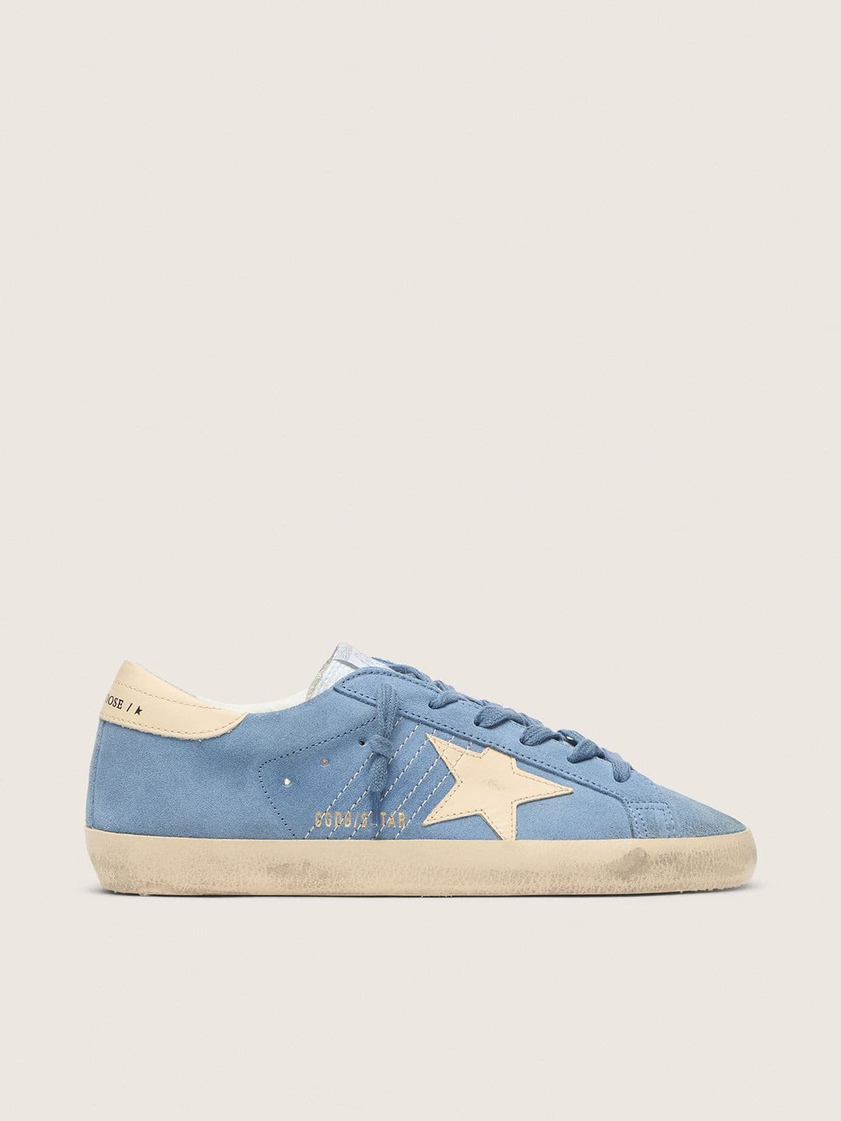 Super-Star in light blue suede with beige leather star and heel tab