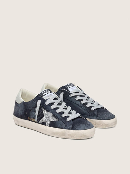 Women’s Super-Star in blue suede with silver glitter star and leather heel tab