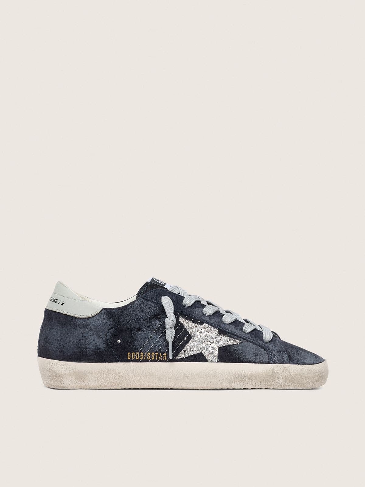 Women’s Super-Star in blue suede with silver glitter star and leather heel tab