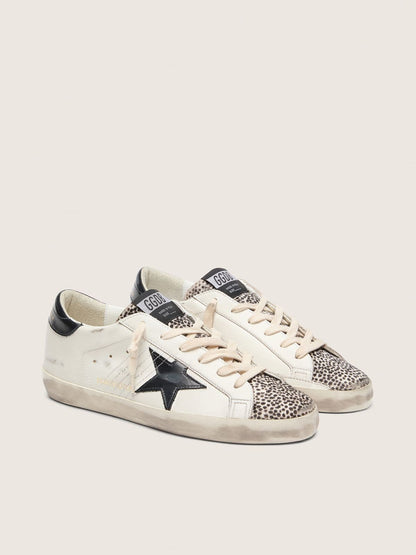Women's Super-Star LTD in white leather with black star and pony skin details