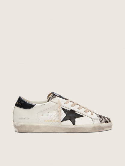 Women's Super-Star LTD in white leather with black star and pony skin details