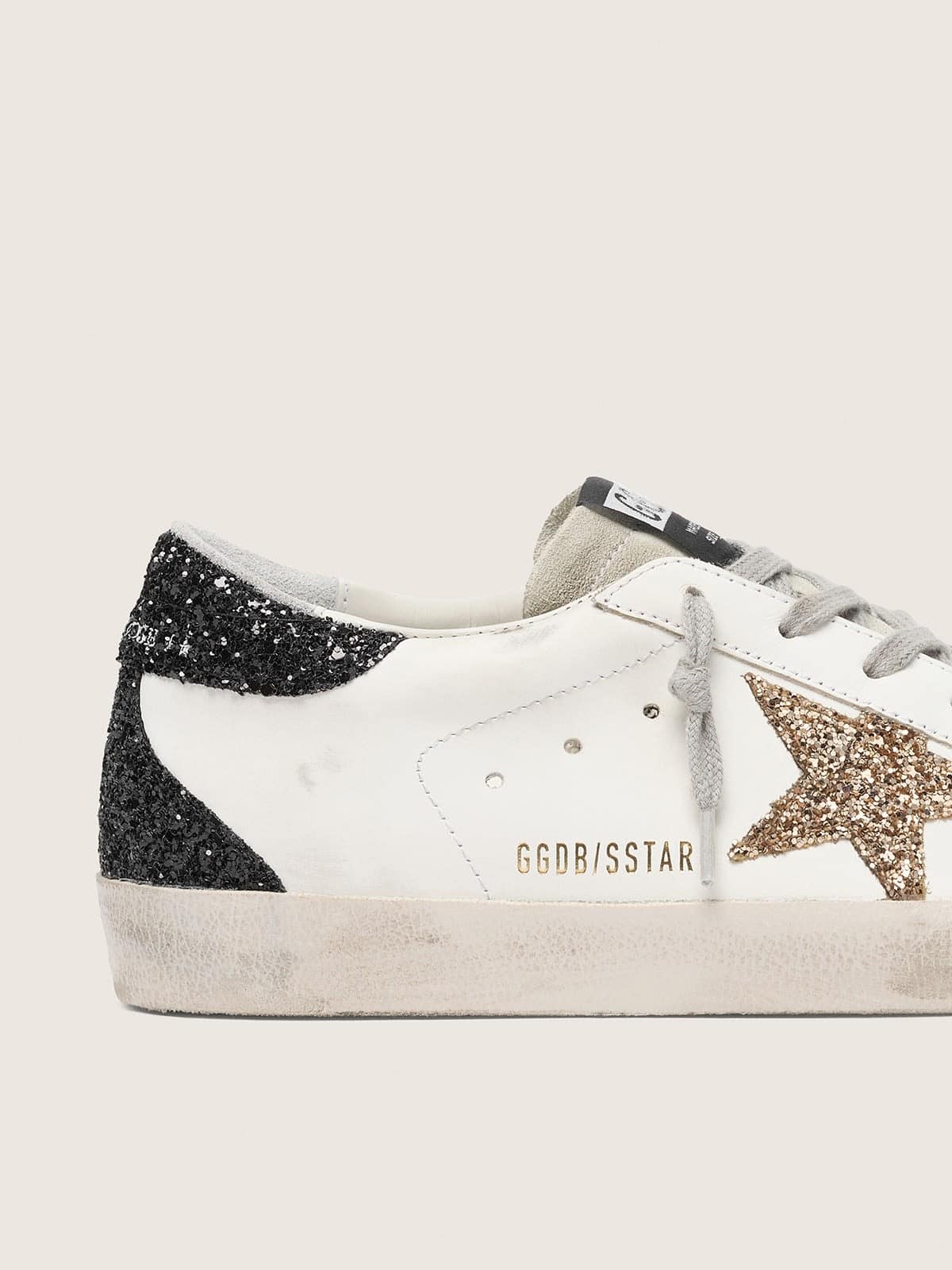 Women’s Super-Star in nappa leather with gold glitter star and black glitter heel tab