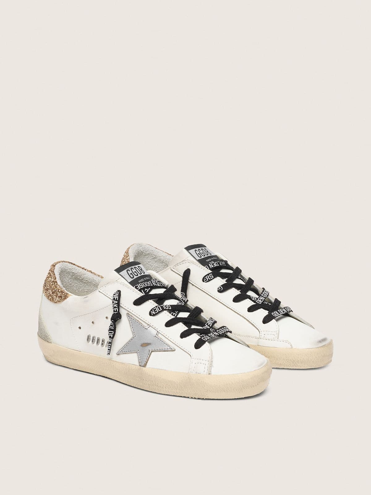 Women's white leather Super-Star with glittery heel tab