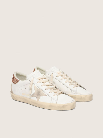 Women's Super-Star with a suede star and peach-pink glitter heel tab