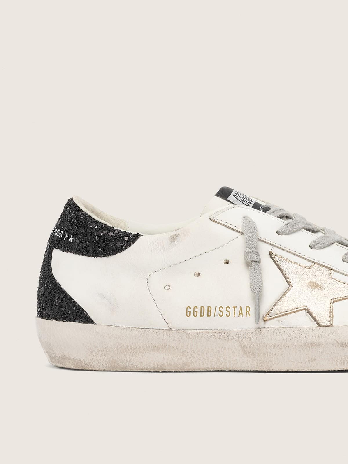 Women's Super-Star with gold star and black glitter heel tab