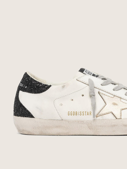 Women's Super-Star with gold star and black glitter heel tab