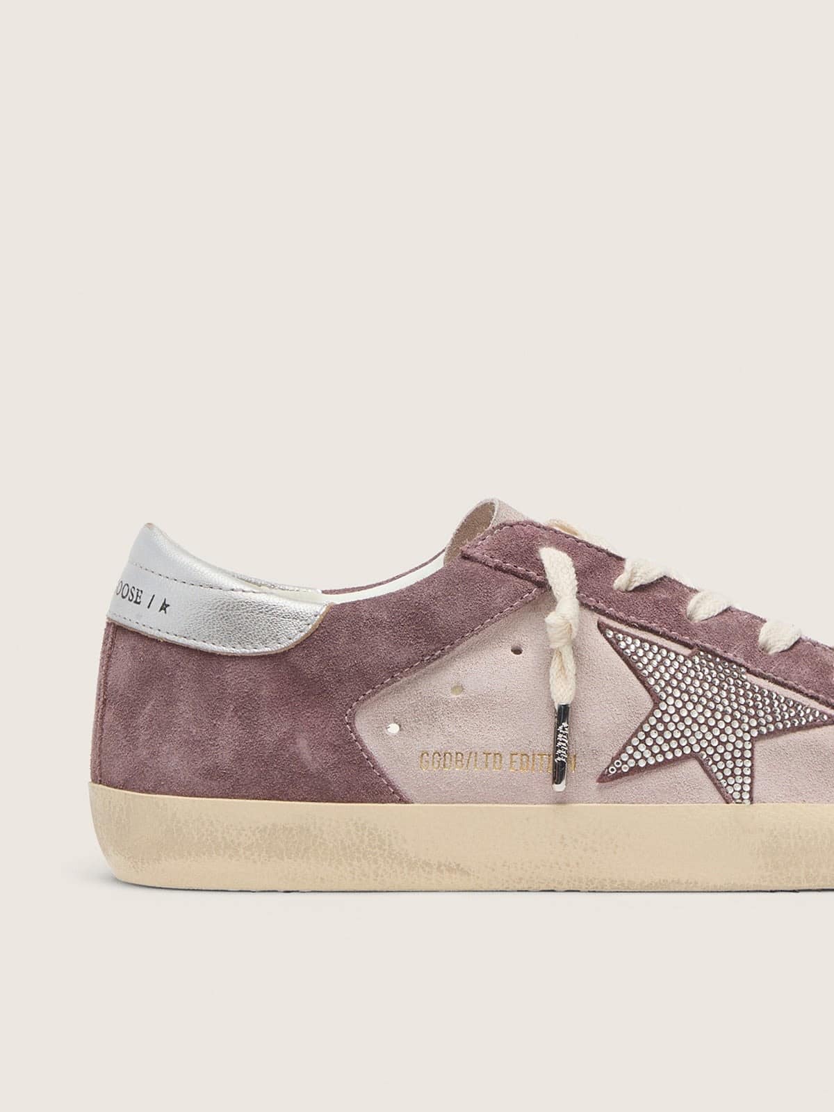 Woman's Super-Star in pale pink suede with suede star and platinum heel tab