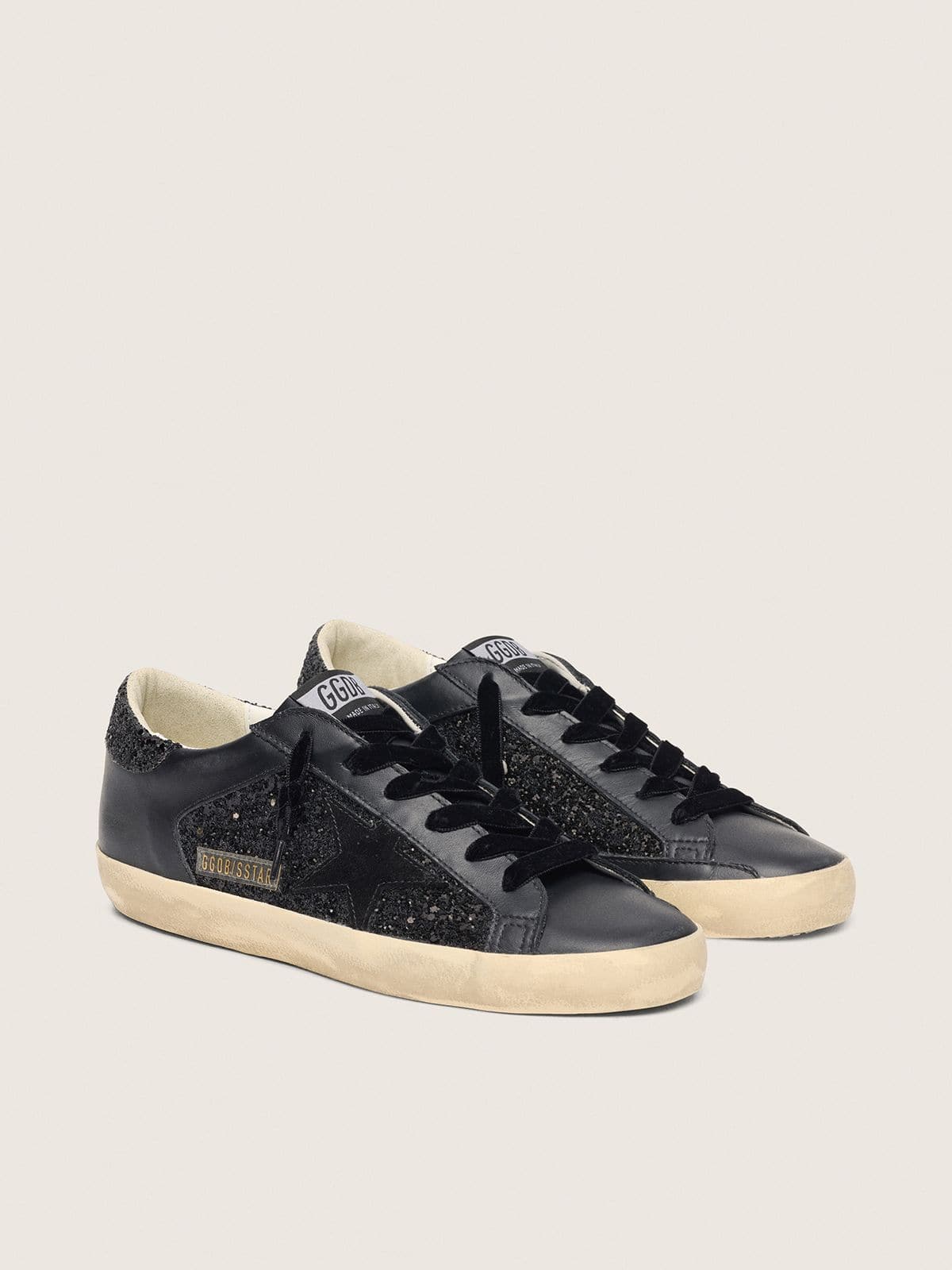 Women's Super-Star in black glitter with black suede star and leather inserts