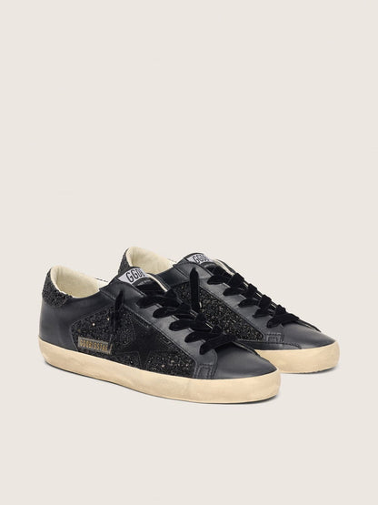 Women's Super-Star in black glitter with black suede star and leather inserts