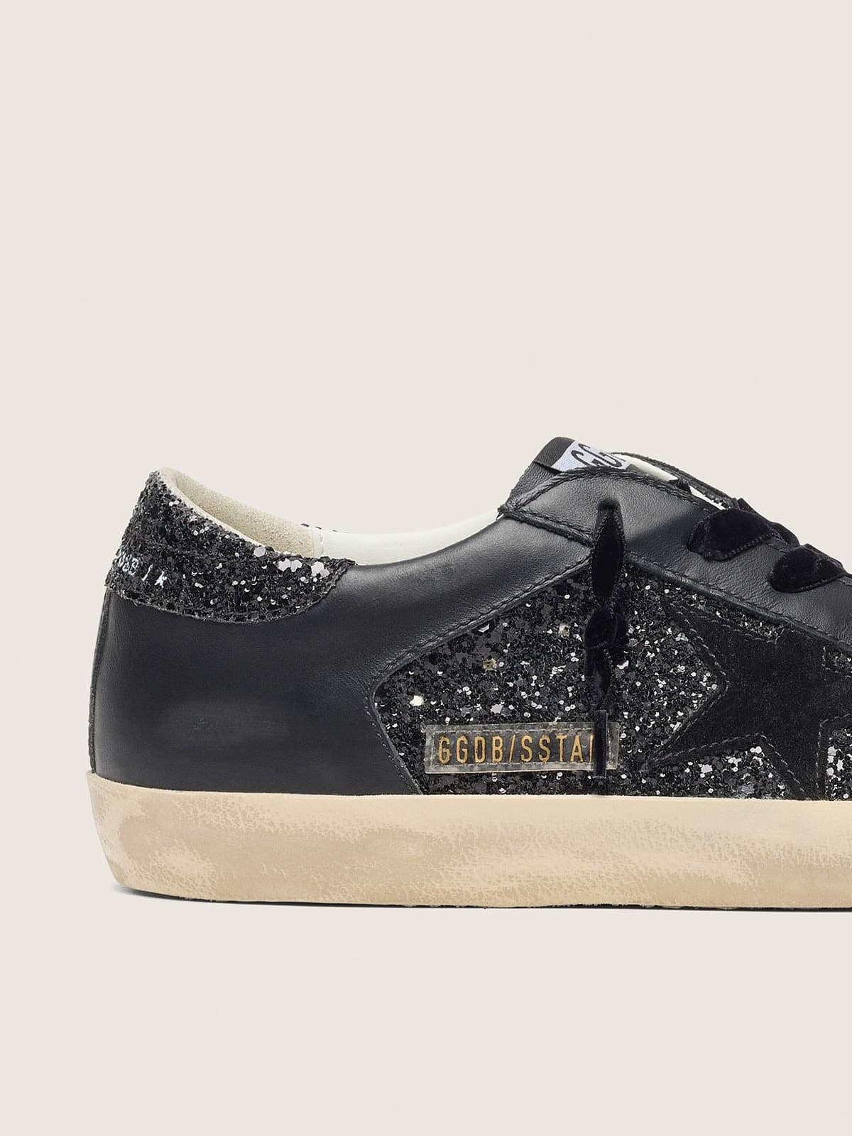 Women's Super-Star in black glitter with black suede star and leather inserts