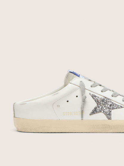 Super-Star Sabot with a platinum glitter star and suede tongue