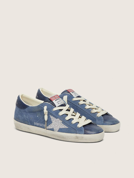 Women’s Super-Star in denim-blue suede with silver glitter star