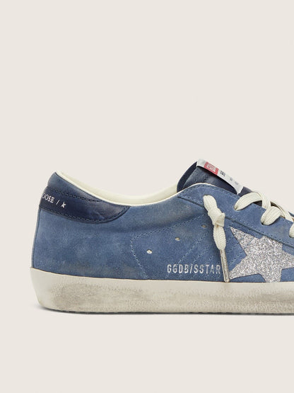 Women’s Super-Star in denim-blue suede with silver glitter star