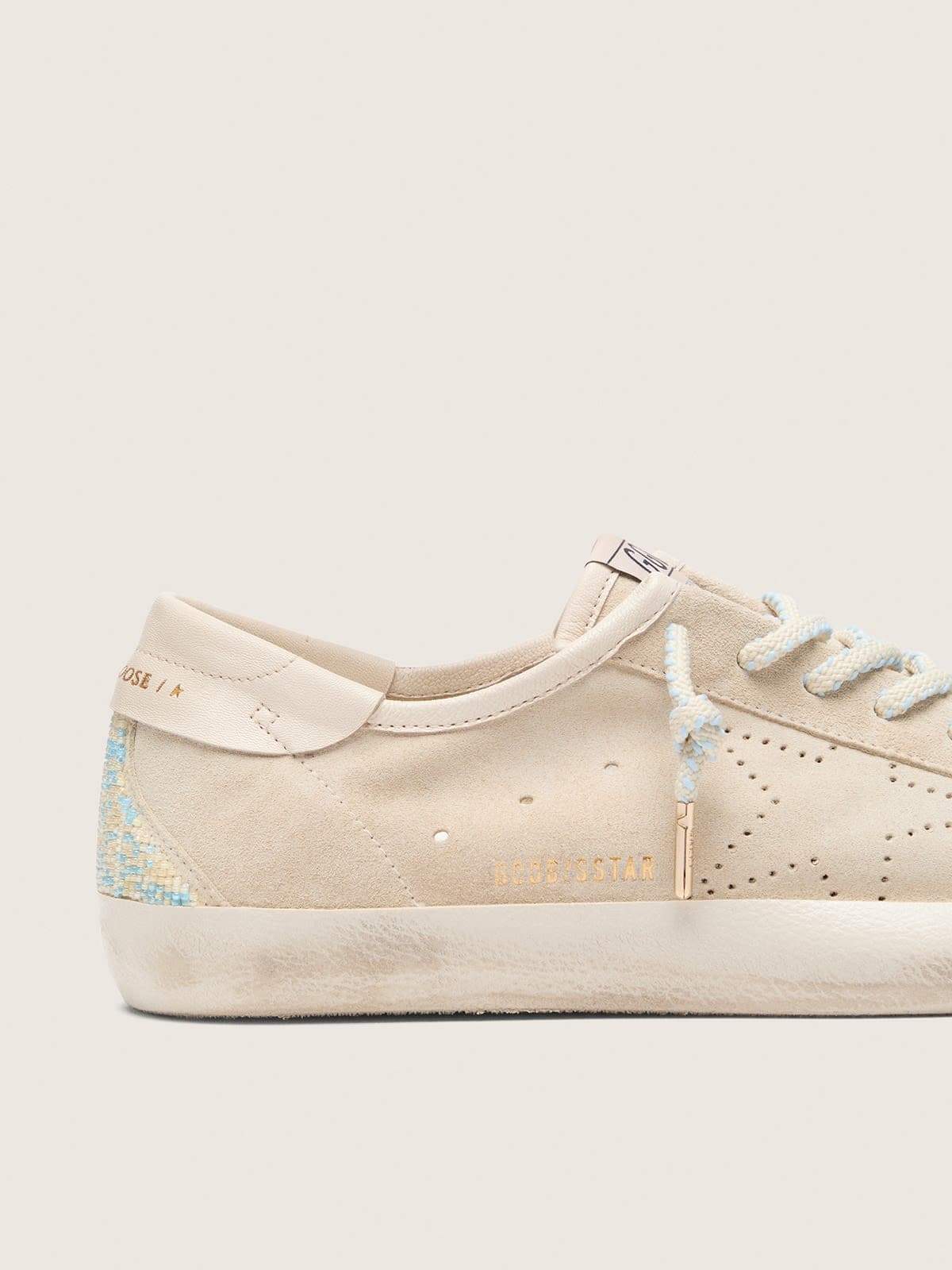 Women’s Super-Star in cream suede with perforated star and bead insert