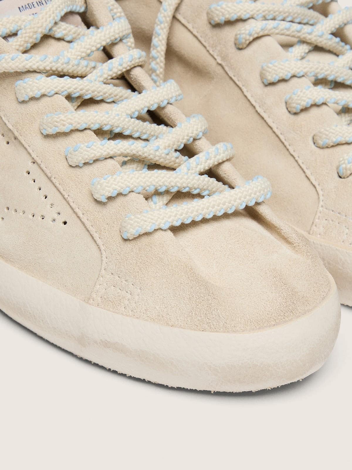 Women’s Super-Star in cream suede with perforated star and bead insert