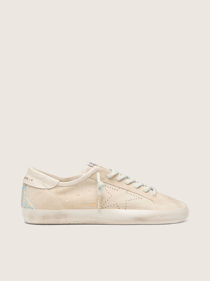 Women’s Super-Star in cream suede with perforated star and bead insert