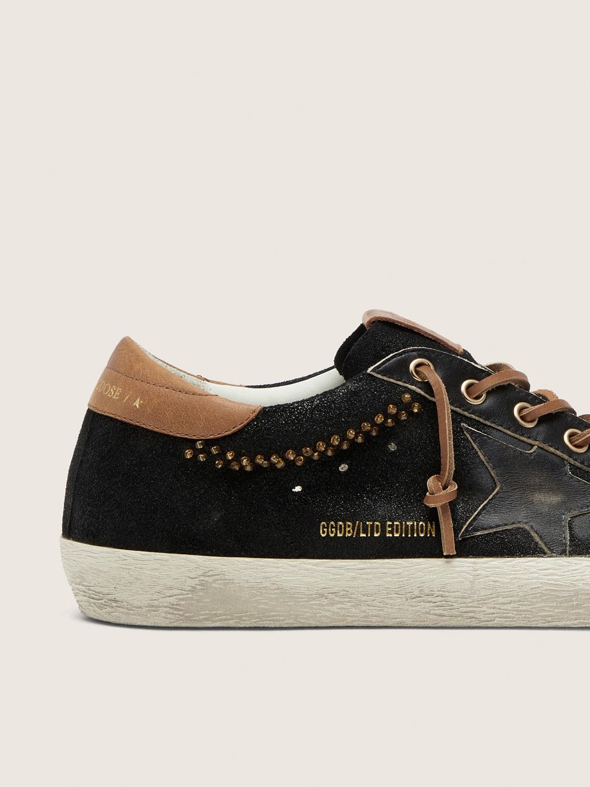 Women’s Super-Star LTD in black glitter leather with black leather star