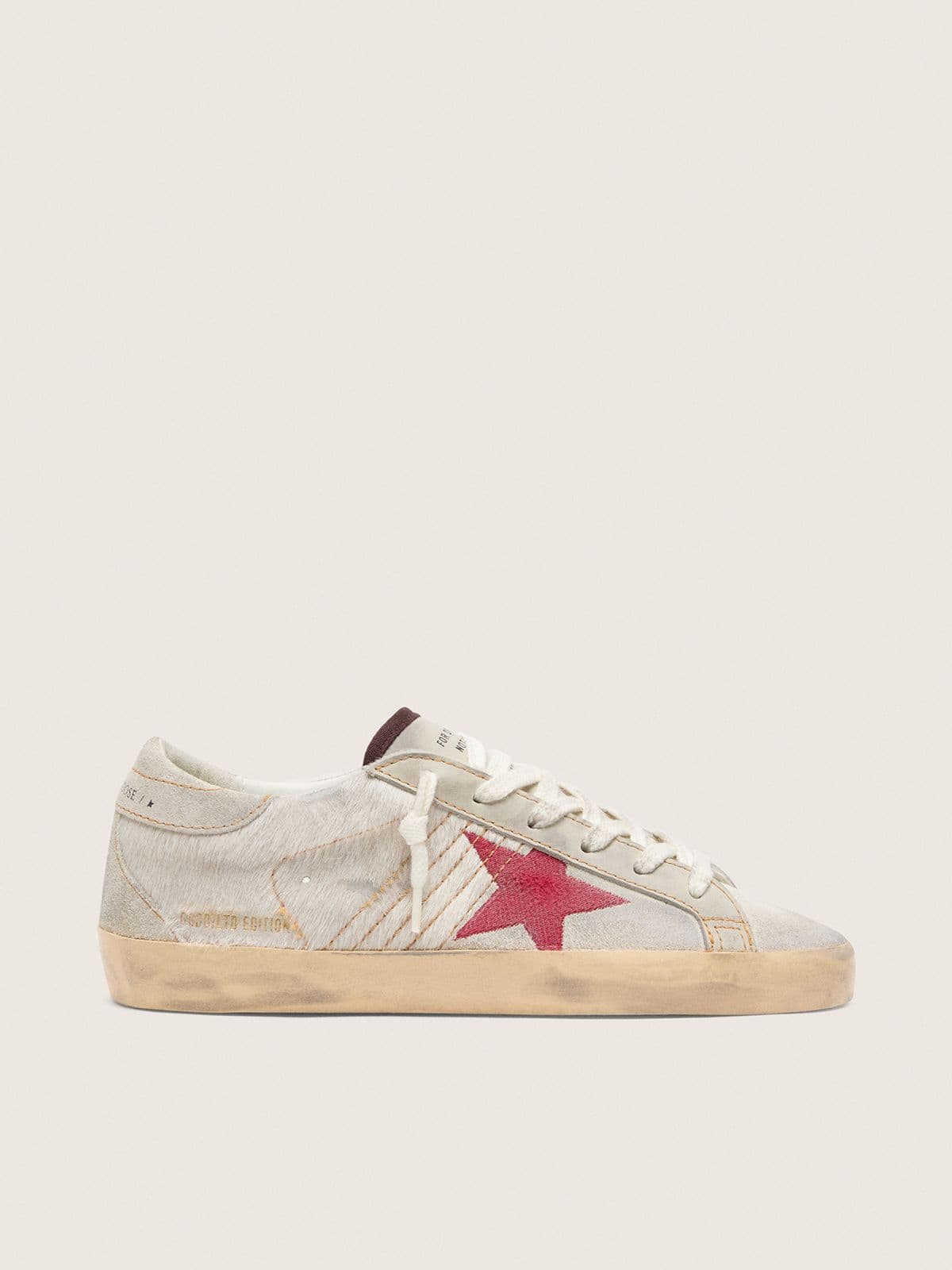 Women’s Super-Star LTD in white pony skin with red suede star