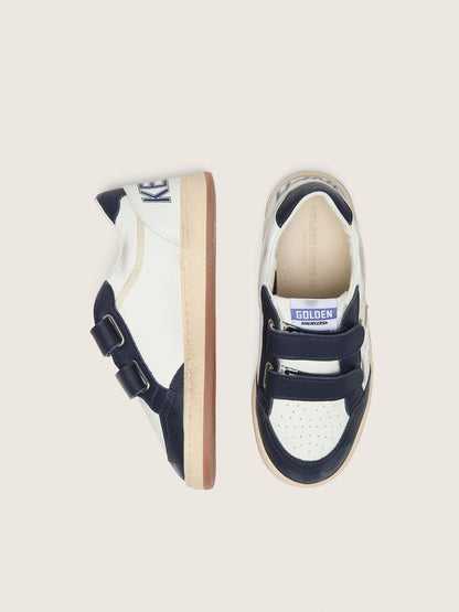 Young Ball Star in white leather with metallic silver leather star and dark blue leather inserts