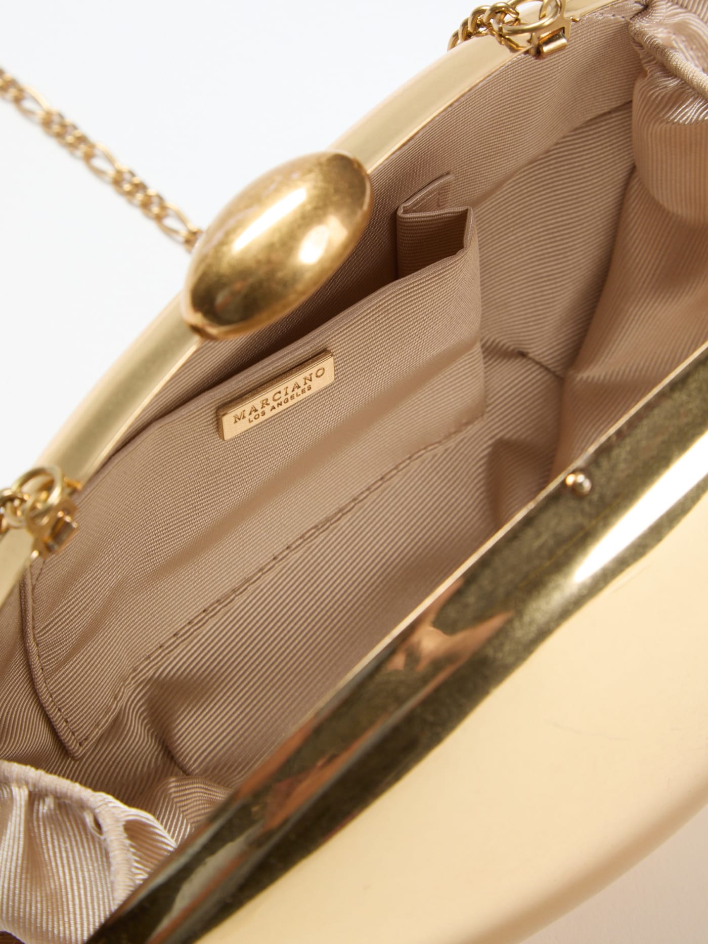 Metallic Oval Clutch