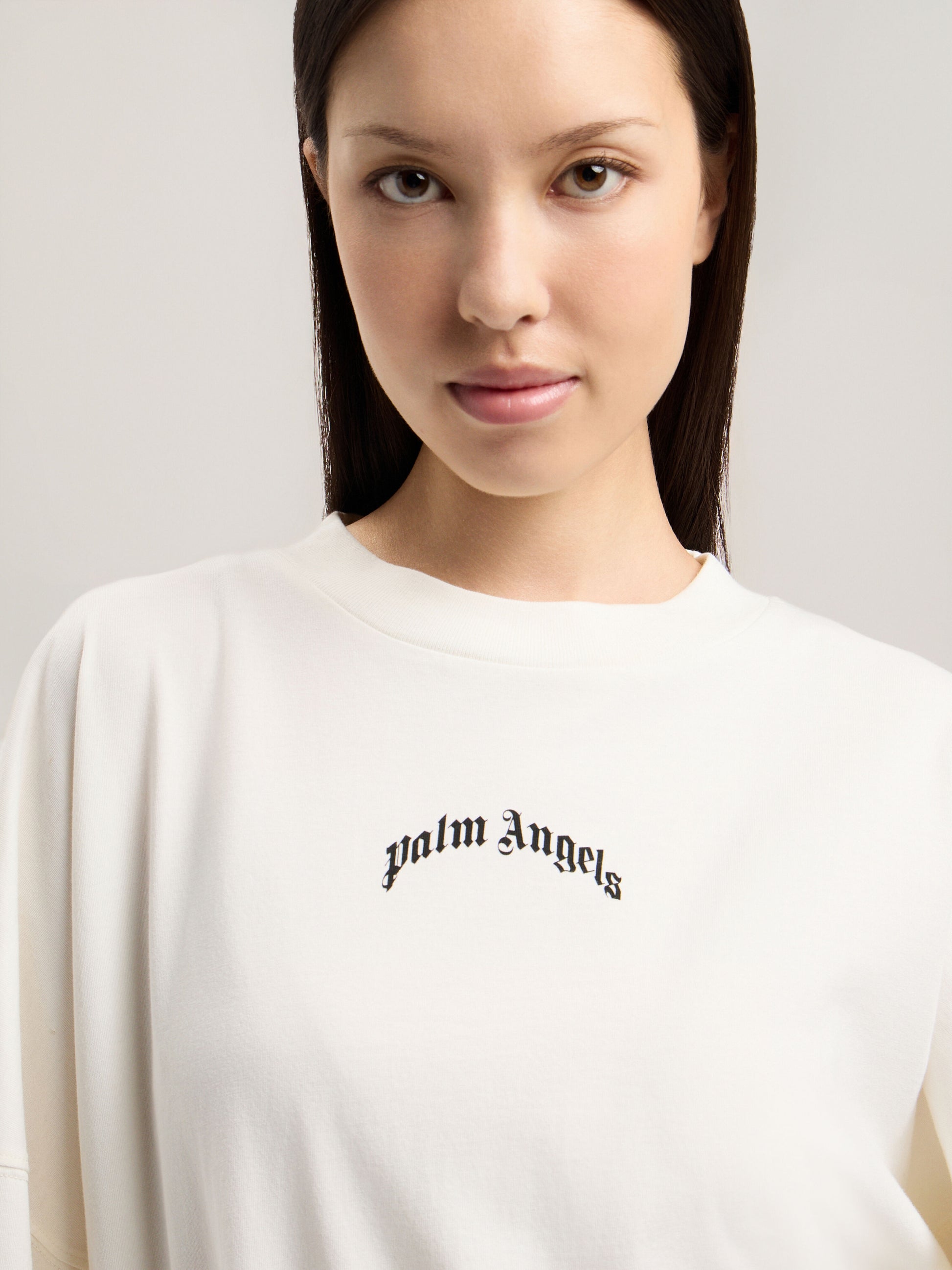 Curved Logo Over T Shirt