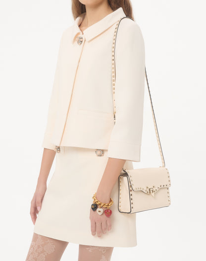 Small Rockstud Grainy Calfskin Crossbody Bag