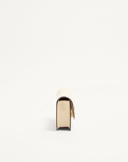 Valentino Garavani Vain Clutch Bag In Shiny Calfskin