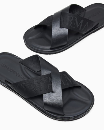 Leather cross-over sandals with logo tape