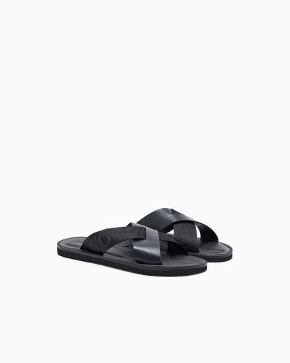 Leather cross-over sandals with logo tape