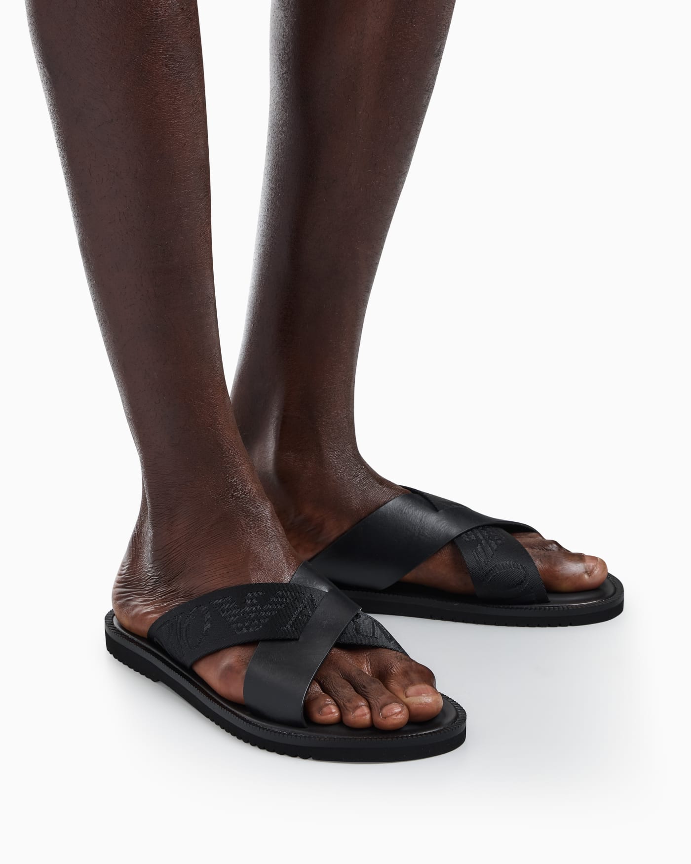 Leather cross-over sandals with logo tape