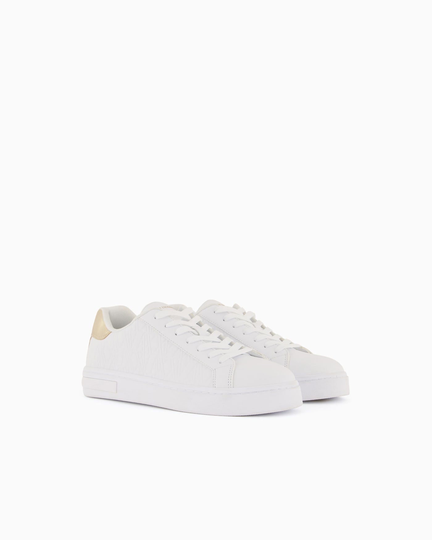 Low-top sneakers with embossed pattern and contrast heel