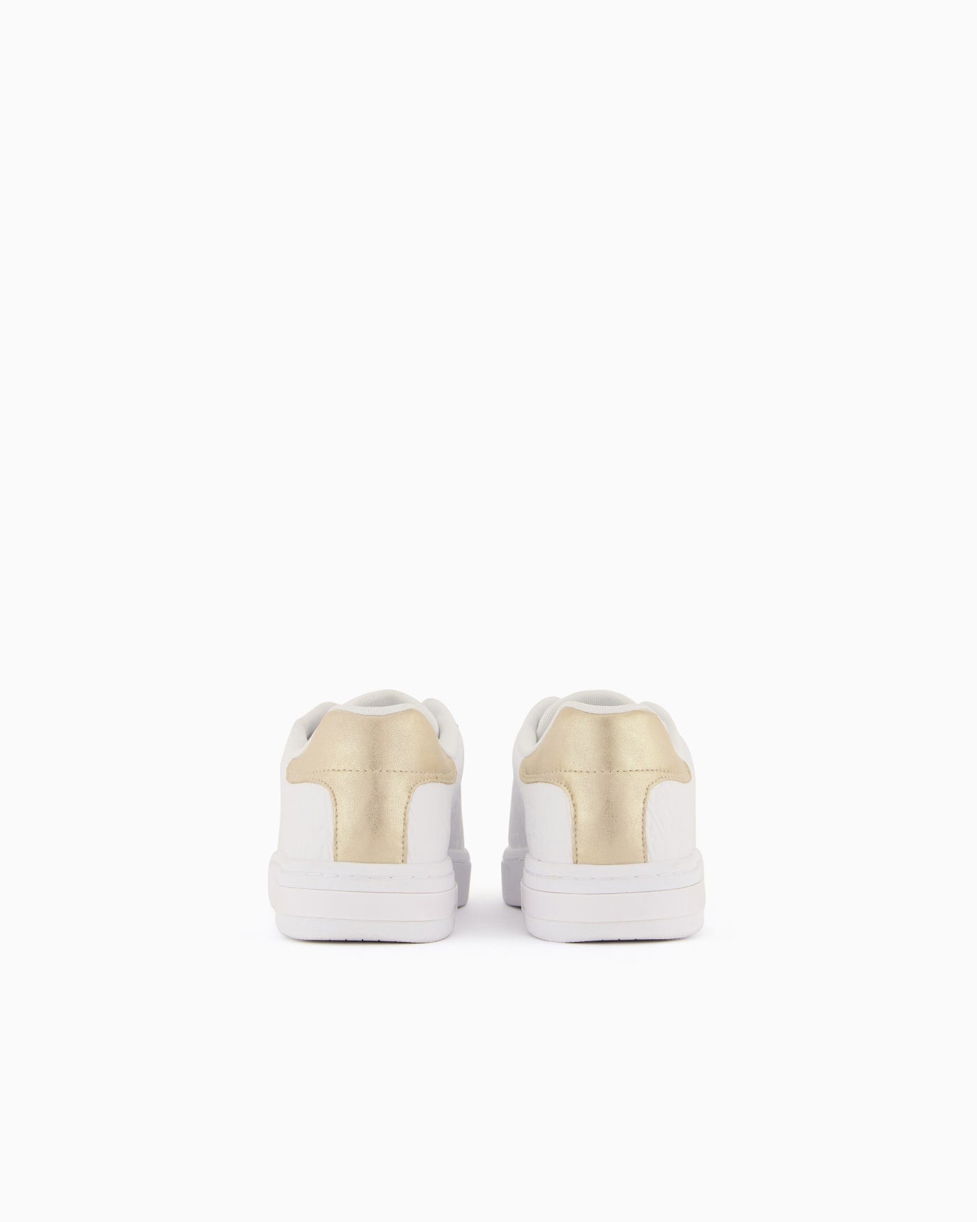 Low-top sneakers with embossed pattern and contrast heel