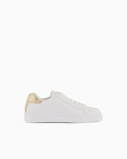 Low-top sneakers with embossed pattern and contrast heel