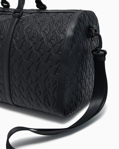 Duffel bag with an embossed pattern and a shoulder strap