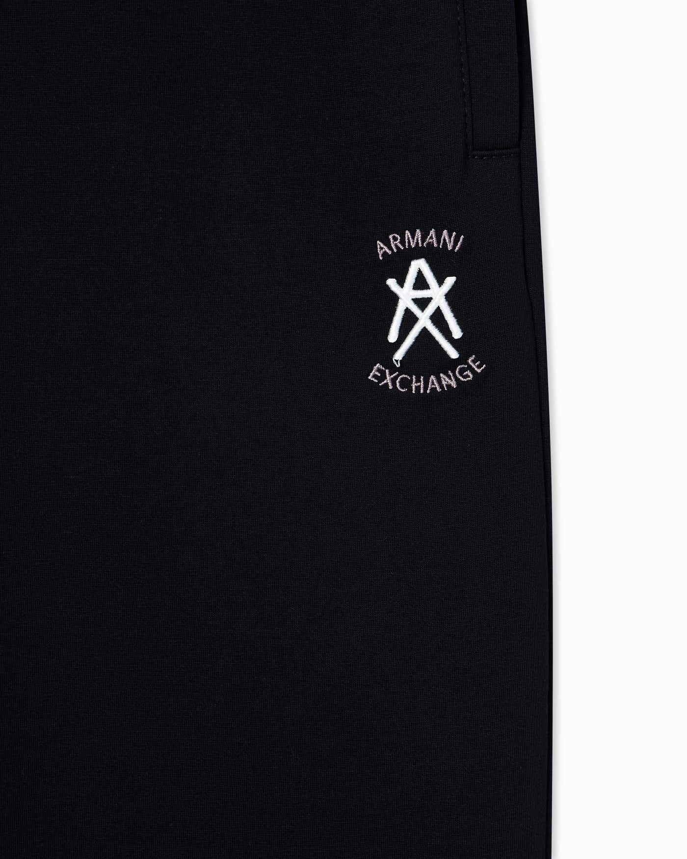Jogger pants with metal logo