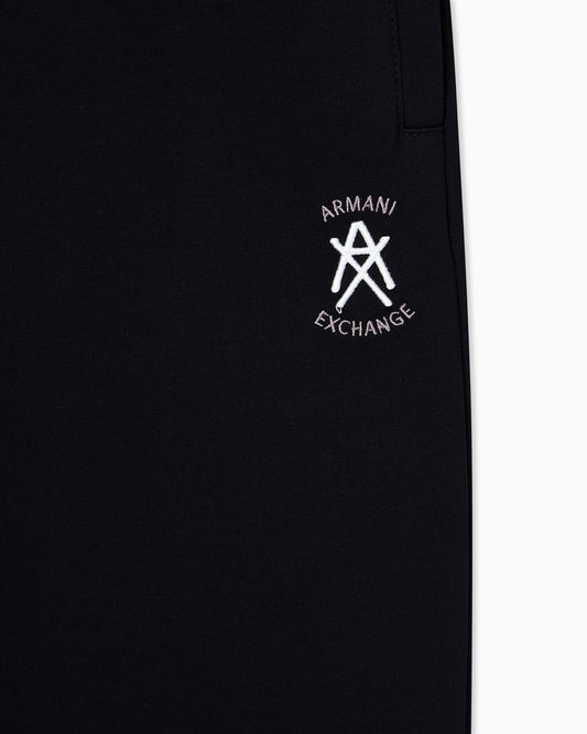 Jogger pants with metal logo